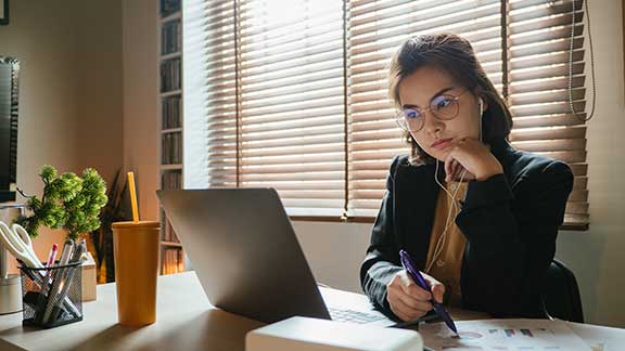 Woman Taking Notes